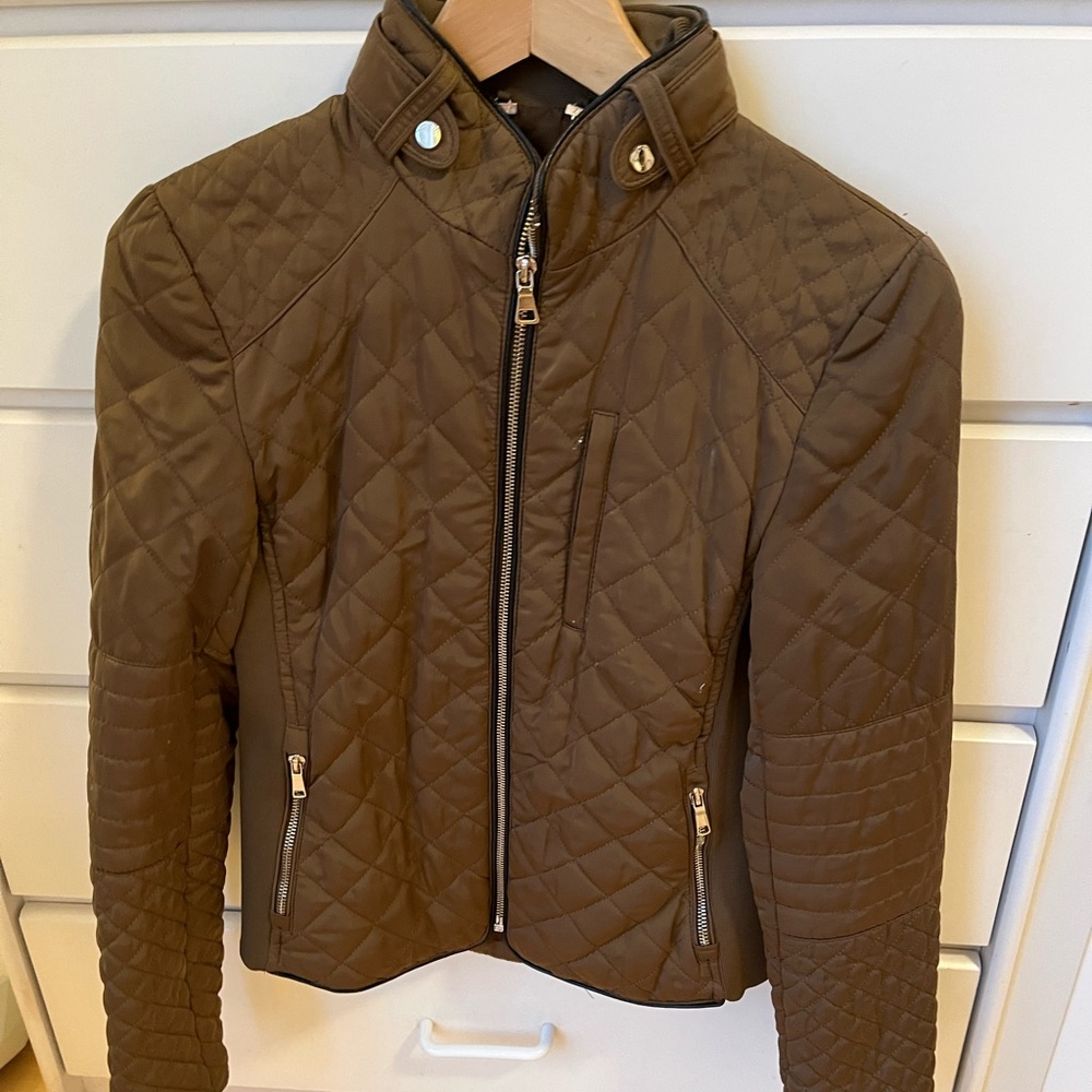 Brown jacket with gold hardware